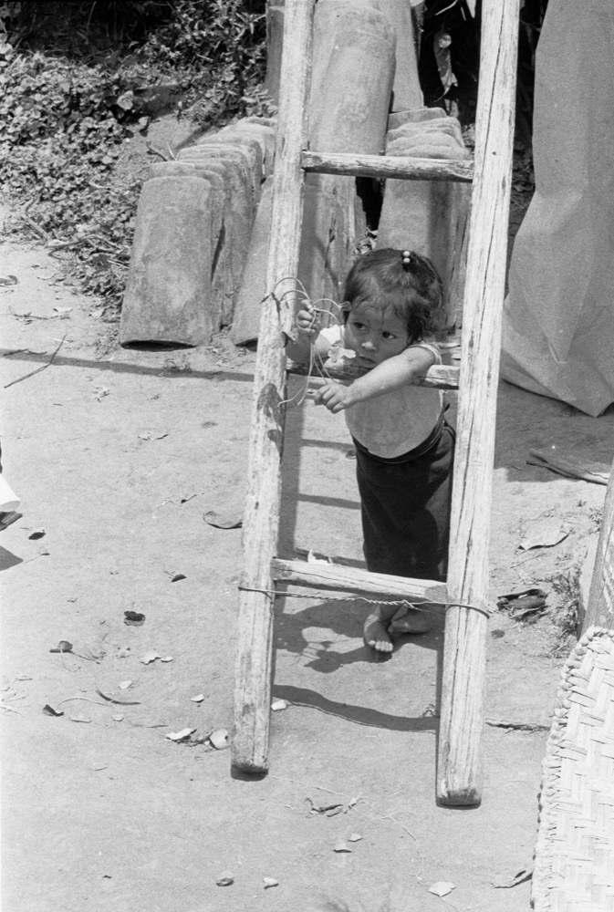 Child, weaver village